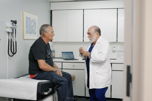Downtown-Omar-with-patient.jpg